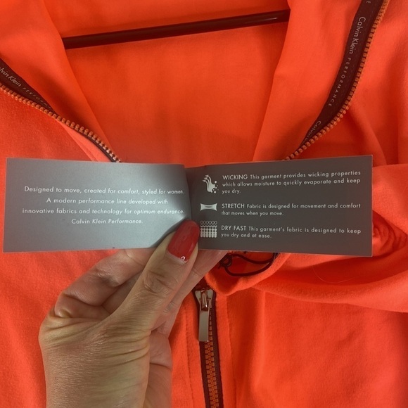Calvin klein bright light orange performance quick dry activewear jacket NWT - Picture 9 of 11